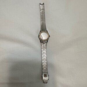 Ebel Womans Classic Wave Watch Diamond Bezel and Diamond hour markers